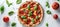 Delicious italian pizza from above on bright white background with copy space for text