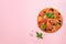 Delicious italian pizza, basil leaves, salt, pepper on pink background with copyspace. Top view. Banner. Pattern for