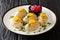 Delicious Jewish Gefilte Fish for Passover with horseradish and carrots close-up in a plate. horizontal. Horizontal