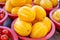 Delicious korean stripe yellow melon fruit food in red plastic basket at tradition market afternoon, Seoul, South Korea, harvest