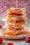 Delicious Layered Puff Pastry Dessert with Sweet Jam Filling and Powdered Sugar on Elegant Plate with Raspberry Accents