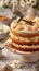 Delicious Layered Vanilla Cake with Cream Cheese Frosting and Vanilla Beans Decoration on Elegant Cake Stand with Spring Blossoms