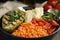 Delicious lentil bowl with soft cheese, avocado and tomatoes, closeup