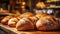 Delicious loaves of bread in a baker shop. Different types of bread loaves on bakery shelves