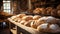 Delicious loaves of bread in a baker shop. Different types of bread loaves on bakery shelves