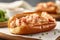 Delicious lobster roll tossed with mayo in a toasted brioche bun. Traditional New England cuisine specialty