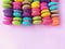 Delicious macaron, colorful macaroon, pink background