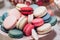 delicious macaroons close-up. candy bar at luxury wedding reception. exclusive expensive catering. table with modern desserts. sp