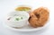 Delicious medu vada served with coconut chutney