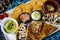 Delicious Mexican cuisine guacamole, taco, tortilla, spicy Mexican chille