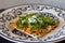 Delicious Mexican tostada with chicken and lettuce