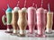 Delicious Milkshakes of different flavors on a table