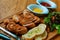 delicious mixed pork sausage with salad and garlic bread