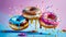 Delicious multi-colored donuts on a colored background cream