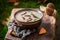 Delicious mushroom soup on old wooden table