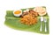 Delicious nasi briyani meal with mutton, dhal on banana leaf