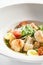 Delicious natural caesar with scallop closeup