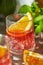 Delicious negroni cocktails with campari, gin, vermouth and slices of citrus orange and ice