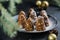 Delicious no bake chocolate  Christmas dessert healthy energy pine cone, sprinkled with powdered sugar. Decorated with fir