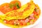 Delicious omelet with tomato, pepper, ham, basil