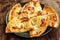 Delicious oven baked tortilla pizza with cheese and salami