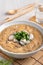 Delicious oyster vermicelli in a bowl on wooden table background