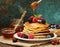 Delicious pancakes with berries and honey, jam