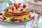 Delicious pancakes with fresh fruits for breakfast