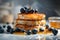 Delicious pancakes with honey, blueberries,