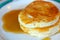 Delicious pancakes with sweet syrup