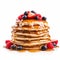 Delicious Pancakes With Syrup And Fresh Berries