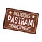 Delicious pastrami served here grungy vintage metal web sign isolated