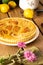 Delicious pear pie from yellow pears on a wooden background