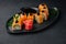 delicious Philadelphia sushi with avocado, creamy cheese, salmon and masago caviar