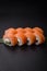 Delicious Philadelphia sushi roll with salmon, shrimp, cucumber and cream cheese