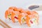 Delicious Philadelphia sushi rolls with rice, avocado, caviar, c
