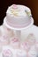 Delicious pink wedding cake and cupcakes