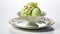 Delicious pistachio ice cream with nuts in a decorative plate on a white background