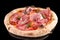 Delicious pizza with tomato sauce, capers and different meats with reflection