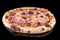 Delicious pizza with tomato sauce, mozzarella, bacon and olives with reflection