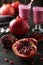 Delicious pomegranate fruit on the black background