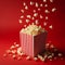 Delicious popcorn scattering from a red striped carton box on red background with copy space