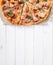 Delicious portioned pizza and text space