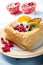 Delicious puff pastry with cream and fruits