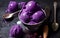 Delicious Purple Coloured Sorbet Styled with Juicy Jamun Fruits Ice Cream in Bowl on Blurry Background