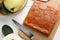 Delicious quince paste and fresh fruit on white wooden table, flat lay