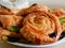 Delicious raisin danish pastry on wooden table