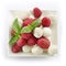 Delicious raspberry salad with mozarella and basil