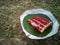 Delicious red velvet cake served on a plate made from banana leaf and recycled paper, magazine or pamphlet