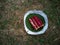 Delicious red velvet cake served on a plate made from banana leaf and recycled paper, magazine or phamplet